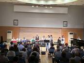 写真：楽団楽唱ikaji活動の様子（1）